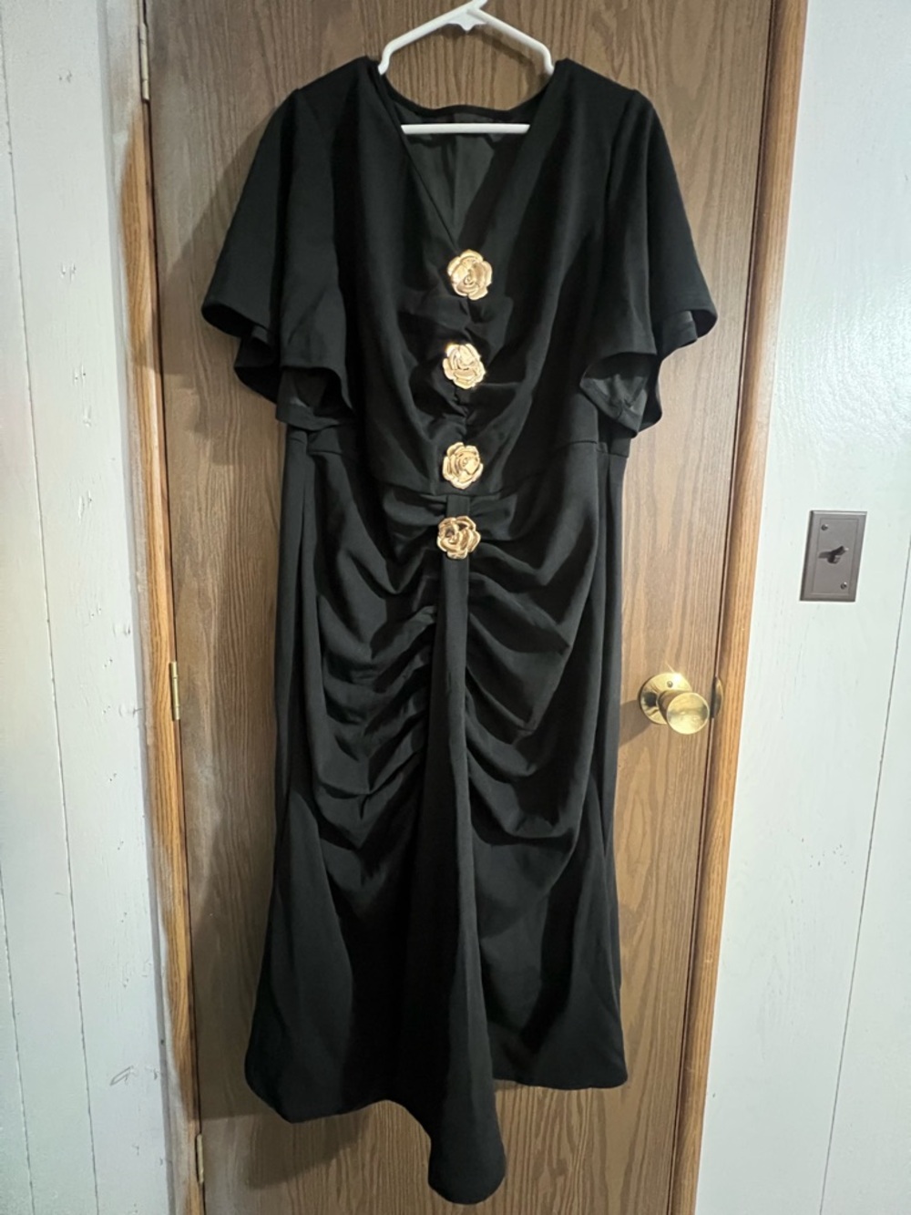 3X woman’s Black Ruched Midi Dress with Gold Floral Accents